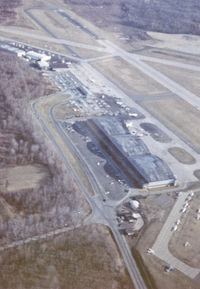 Westchester County Airport (HPN) - Westchester County (NY) airport in the pattern, taken in 1970. - by Mike Boland