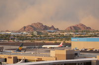 Phoenix Sky Harbor International Airport (PHX) - A big dust storm is approaching PHX from the east. - by Dave Turpie