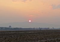 Boise Air Terminal/gowen Fld Airport (BOI) - Sunrise during the fire season. Visibility could be from 6 to 2 miles during August. - by Gerald Howard