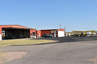 Torrington Municipal Airport (TOR) - Hangars of Ag-flyers at Torrington airport, WY - by Jack Poelstra