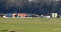 Thruxton Aerodrome - Long distance view of the airfield dump at Thruxton - on the south side - showing the hulks of three unidentified helicopters, including a Westland Scout AH.1 airframe. - by Clive Pattle