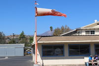 Santa Paula Airport (SZP) - Newest windsock a bit tattered from both santanas and on-shore strong winds - by Doug Robertson