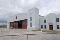 Orlampa Inc Airport (FA08) - hangar of the reduced temporary Fantasy of Flight Museum at Orlampa airport, Polk City FL - by Ingo Warnecke