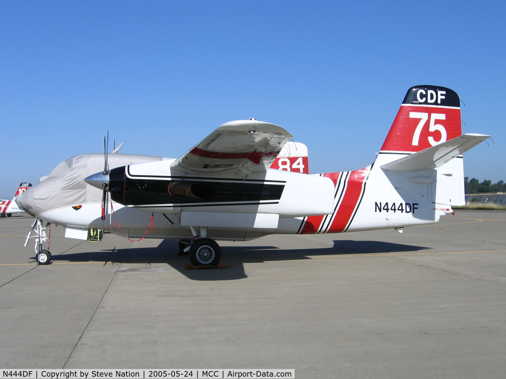 N444DF, Marsh Aviation S-2F3AT C/N 151654, CDF S-2T #75 on CDF ramp at McClellan AFB, CA (black fin/red tail)