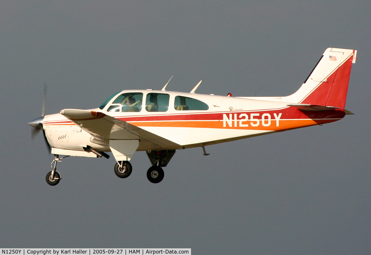N1250Y, 1966 Beech 35-C33 Debonair C/N CD-1039, landing on runway 23