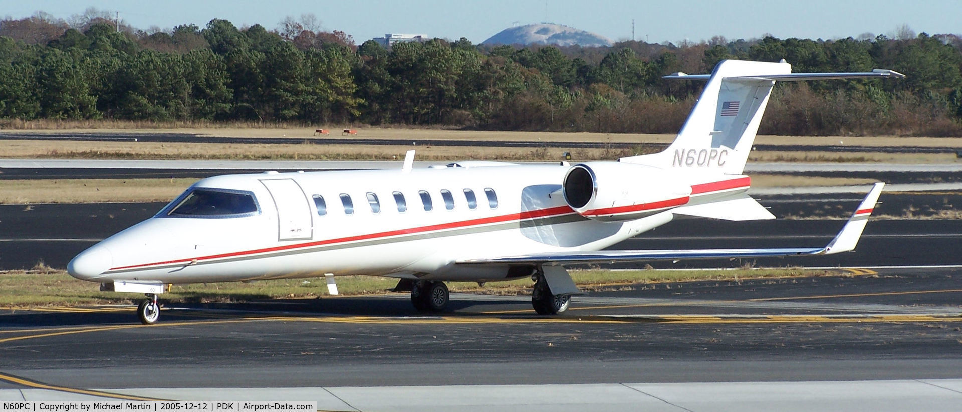 N60PC, 2008 Learjet 45 C/N 351, Southern Companies returning home to PDK