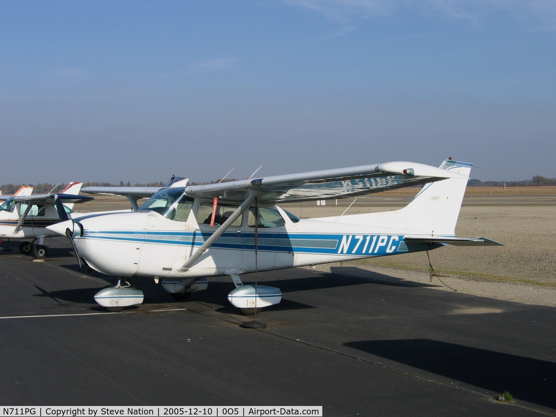 N711PG, Cessna 172M C/N 17264422, Cal Aggie Flying Farmers 1983 Cessna 172M in December sun at University Airport (Davis), CA