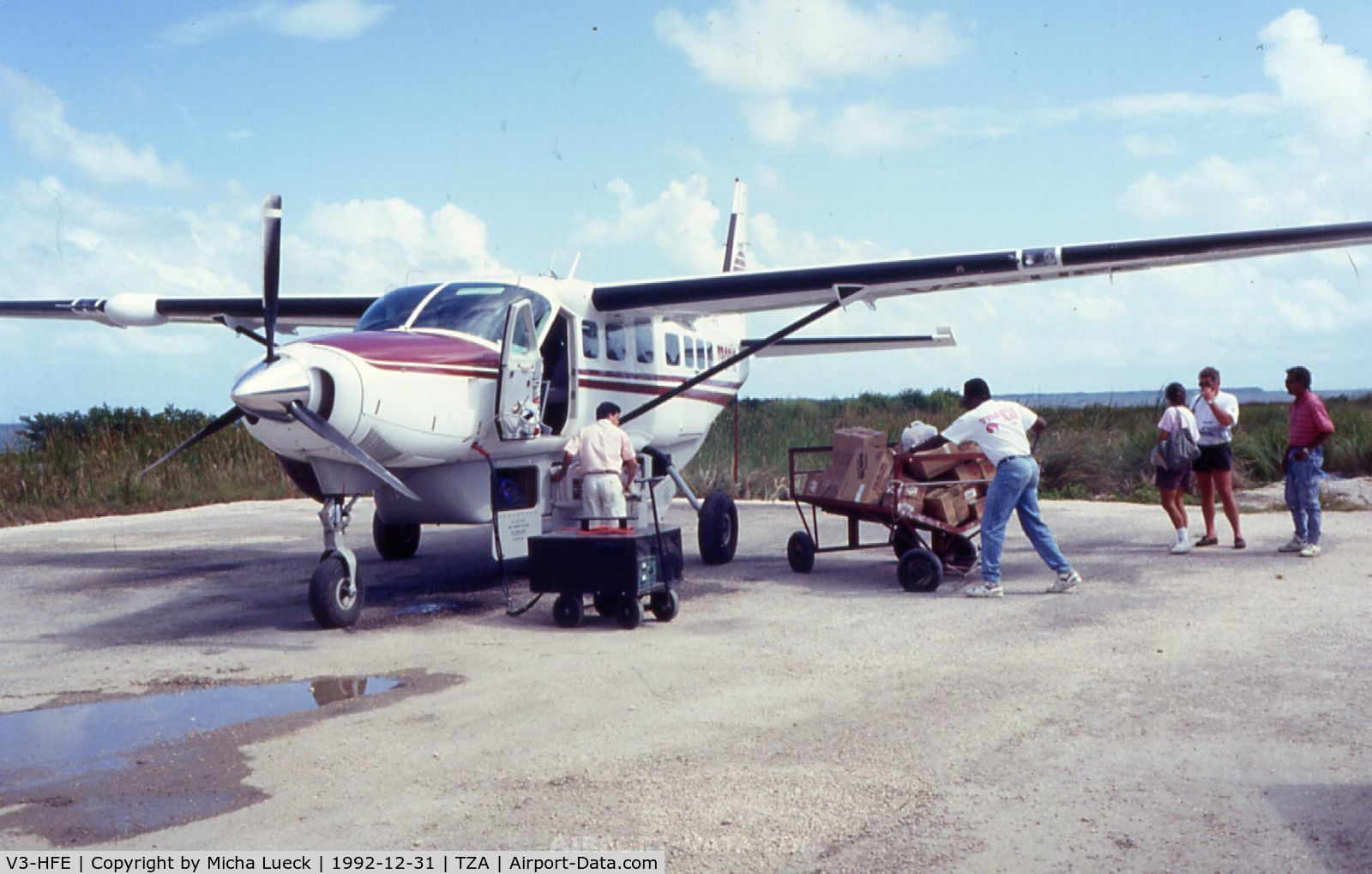 V3-HFE, Cessna 208 Caravan 1 C/N Not found V3-HFE, Loading for the 13 minute trip from Belize Municipal to San Pedro/Ambergris Caye