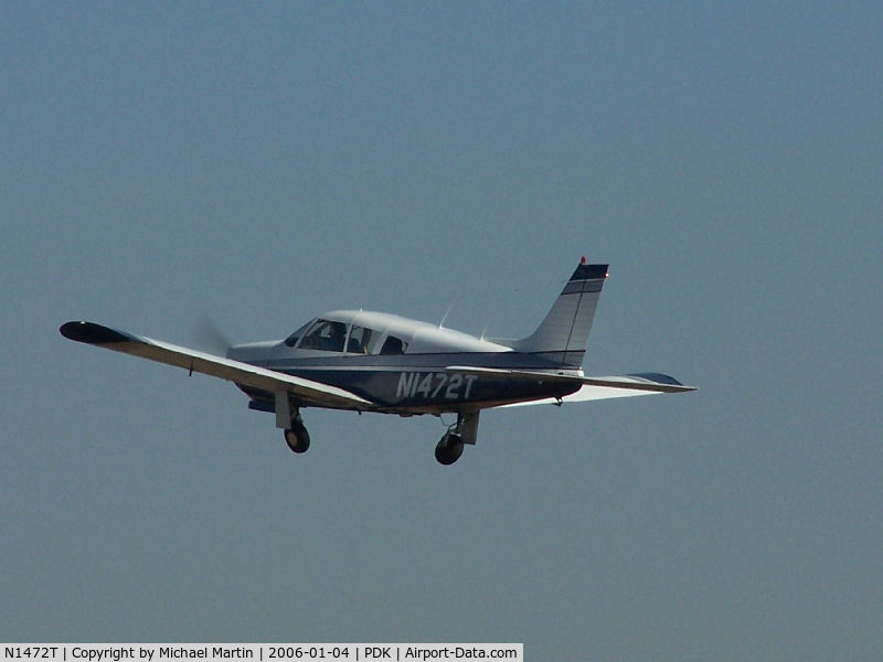 N1472T, 1972 Piper PA-28R-200 C/N 28R-7235298, Departing PDK - Starting to rotate gear.