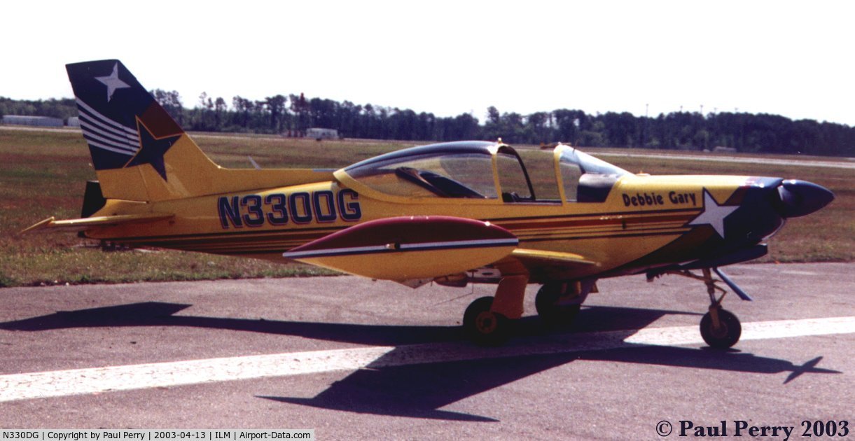 N330DG, 1991 SIAI-Marchetti SF-260D C/N 766, Debbie's plane parked before the crowd