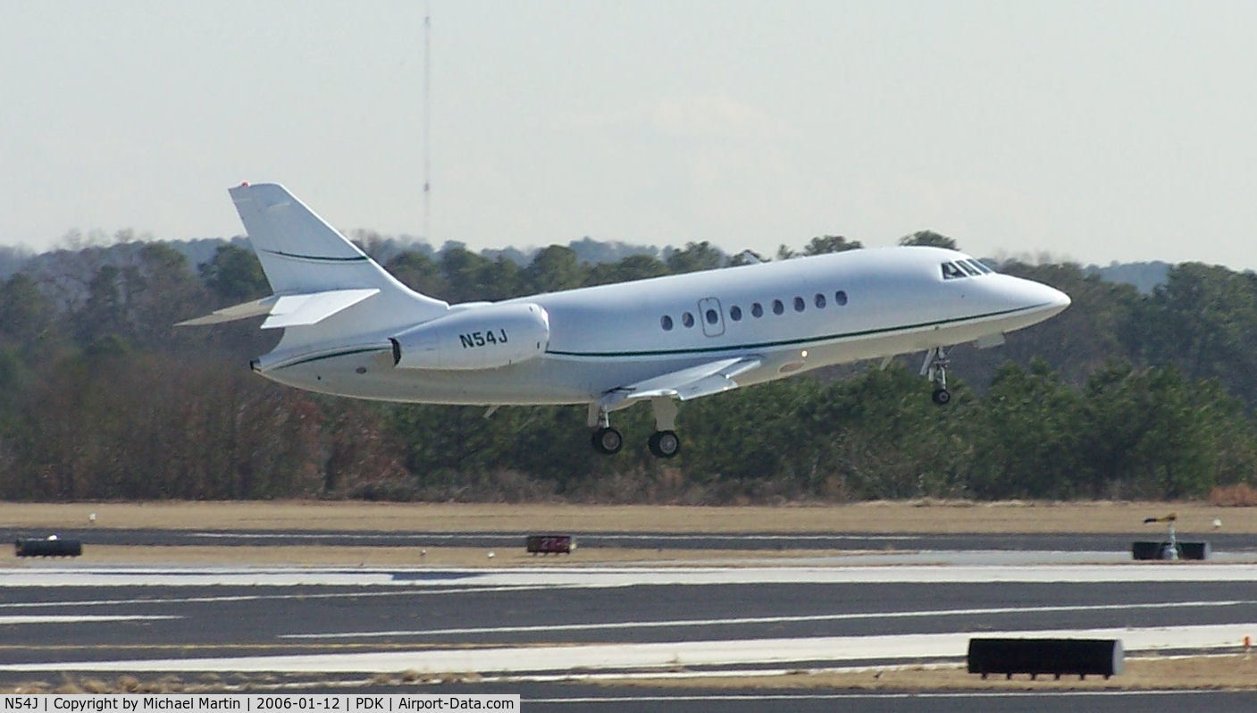 N54J, 2001 Dassault Falcon 2000 C/N 141, Departing PDK on 20L