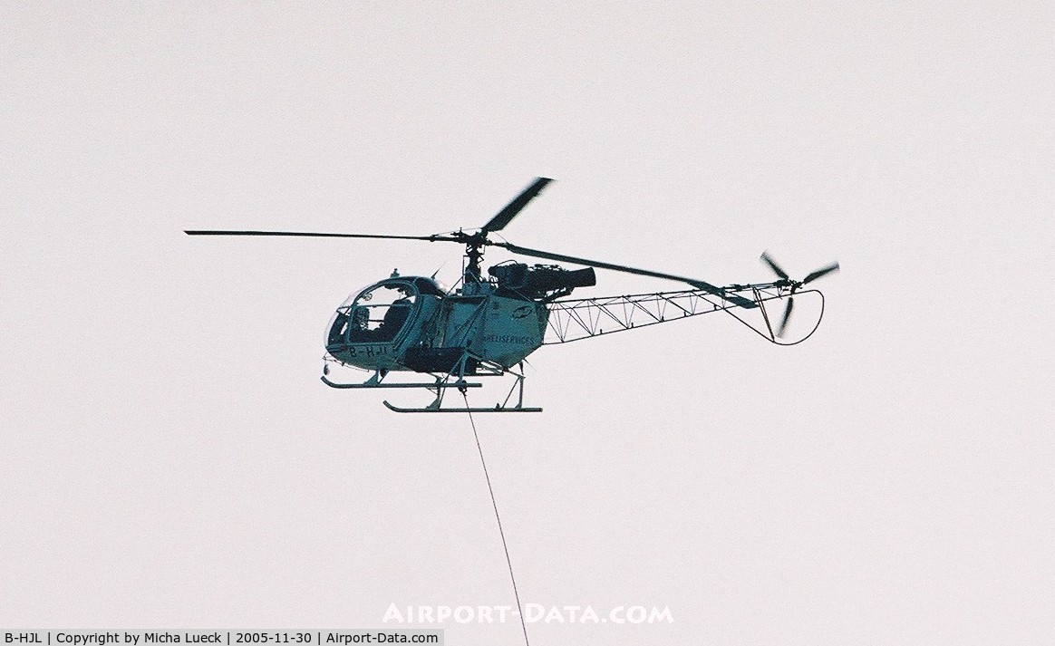 B-HJL, Aérospatiale SA-315B Lama C/N 2618, Eurocopter 315B Lama of Heliservices Hong Kong working on powerlines on Lantau island, close to Hong Kong airport