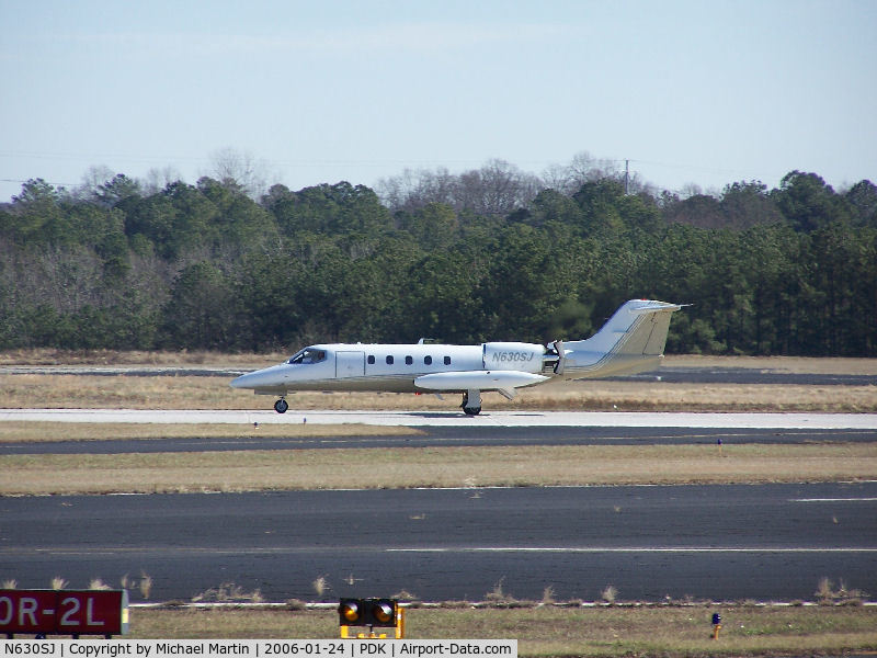 N630SJ, 1980 Gates Learjet 35A C/N 344, Landing PDK on 2R with airbrakes extended