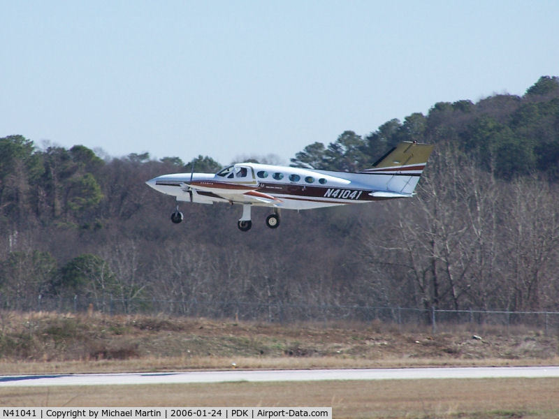 N41041, 1973 Cessna 421B Golden Eagle C/N 421B0412, Departing PDK - Starting to rotate gear.