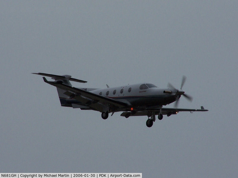 N681GH, 2005 Pilatus PC-12/45 C/N 681, Landing PDK on 20L (heavy cloud cover)