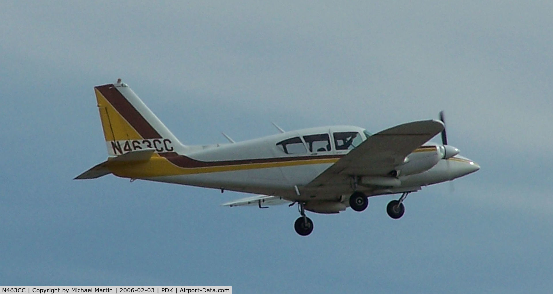 N463CC, 1966 Piper PA-23-250 Aztec C/N 27-3357, Departing PDK - Starting to rotate gear.