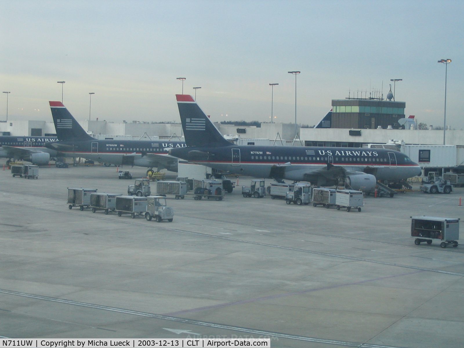 N711UW, 1999 Airbus A319-112 C/N 1033, Two A319s of US Airways at Charlotte, NC