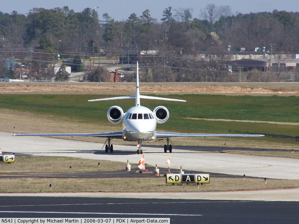 N54J, 2001 Dassault Falcon 2000 C/N 141, Taxing to Mercury Air Center