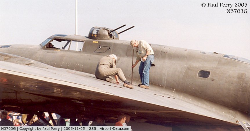 N3703G, 1945 Boeing B-17G Flying Fortress C/N 44-83546-A, Two old pros checking the fuel state of the Memphis Belle