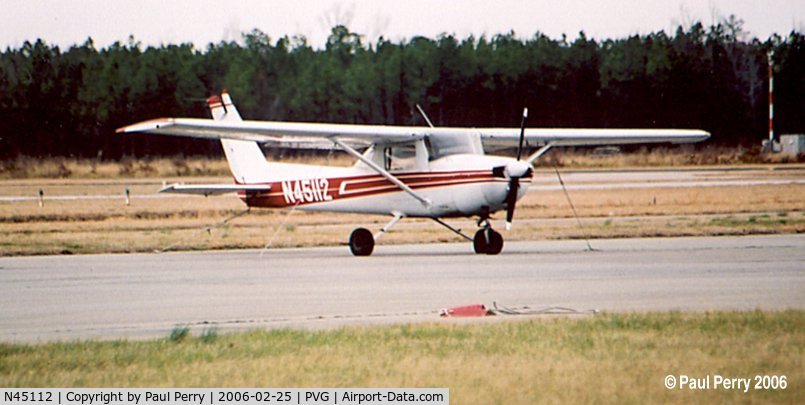 N45112, 1975 Cessna 150M C/N 15076739, Cessna sitting on the ramp near her almost-twin.