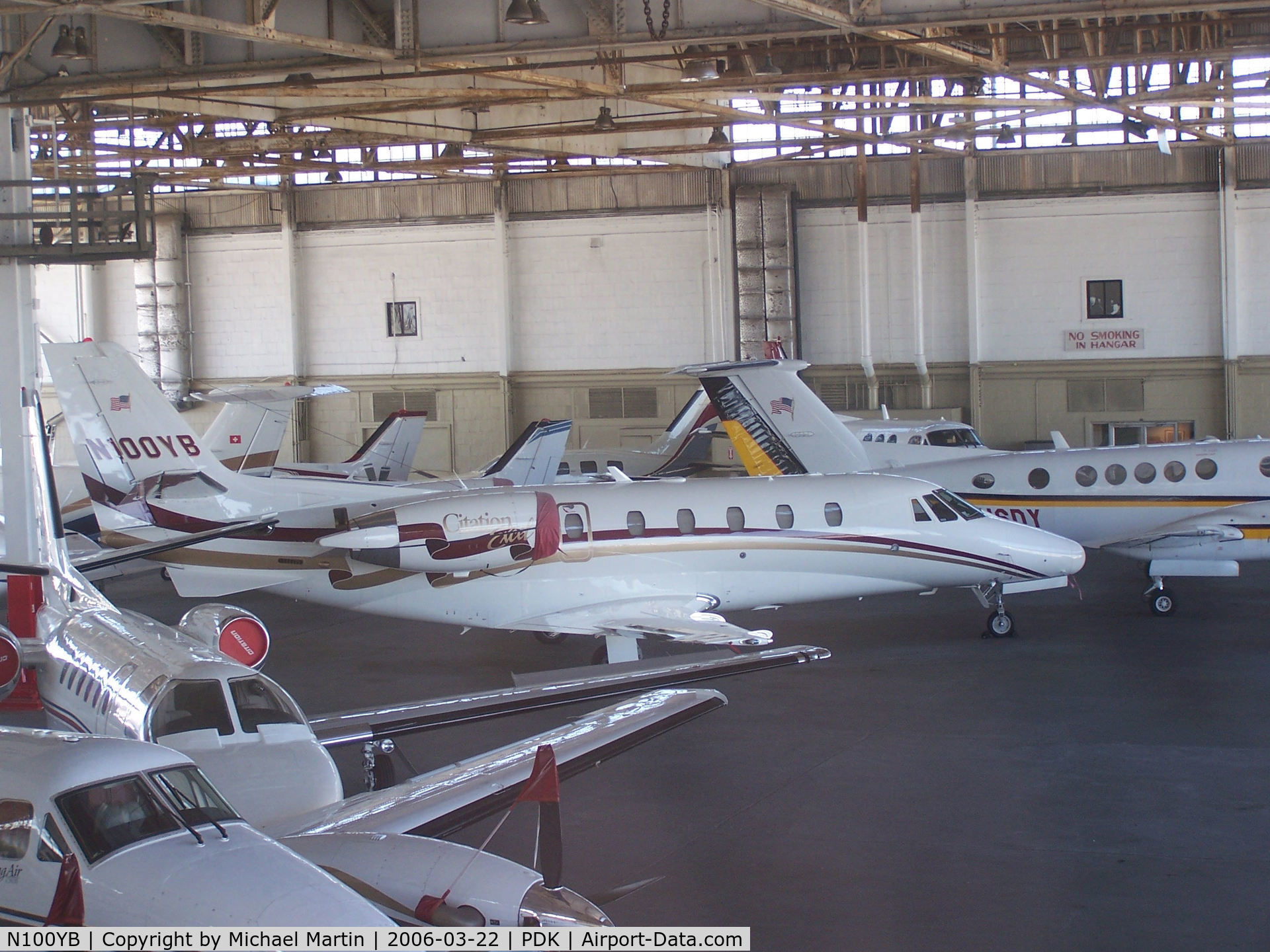 N100YB, Cessna 560XL Citation Excel C/N 560-5136, In Epps Air Service hanger with various other aircraft.