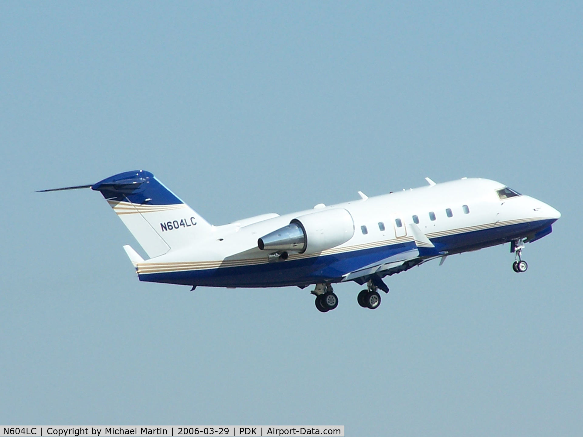 N604LC, 1998 Bombardier Challenger 604 (CL-600-2B16) C/N 5373, Departing PDK - Gear Up!