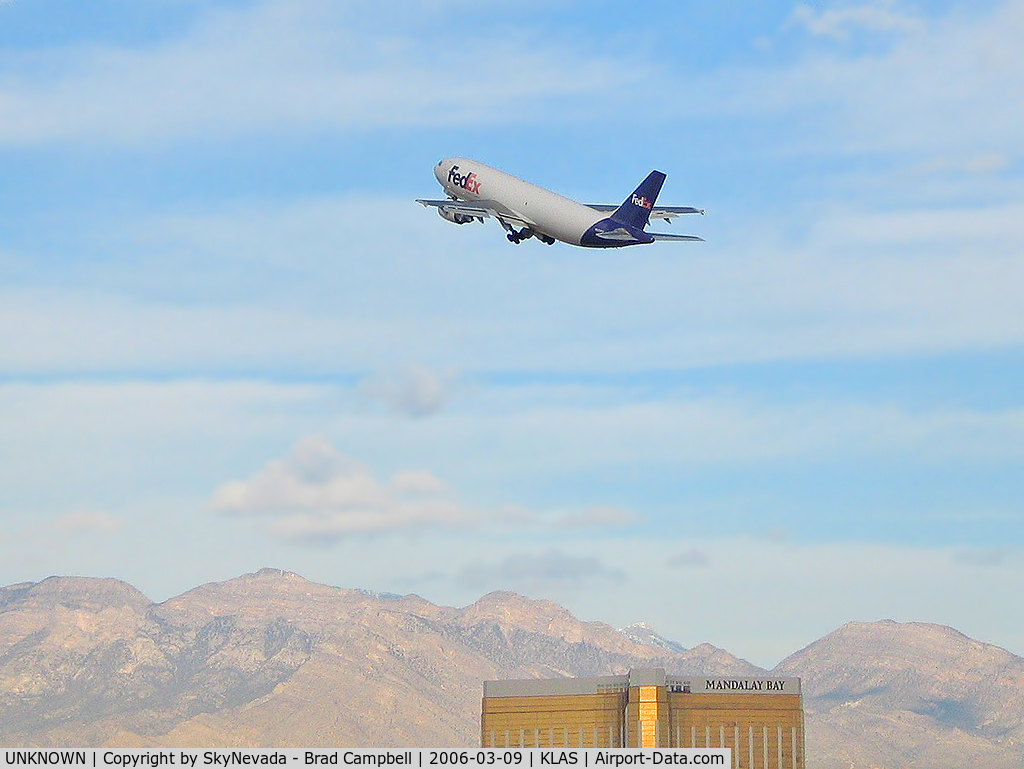 UNKNOWN, Airliners Various C/N Unknown, FedEx over Mandalay Bay - Spring Mountains in background