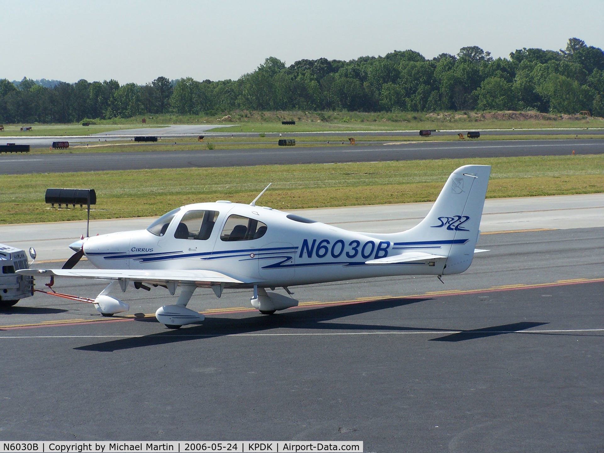N6030B, 2003 Cirrus SR22 C/N 0606, Being towed to parking at Mercury Air Center