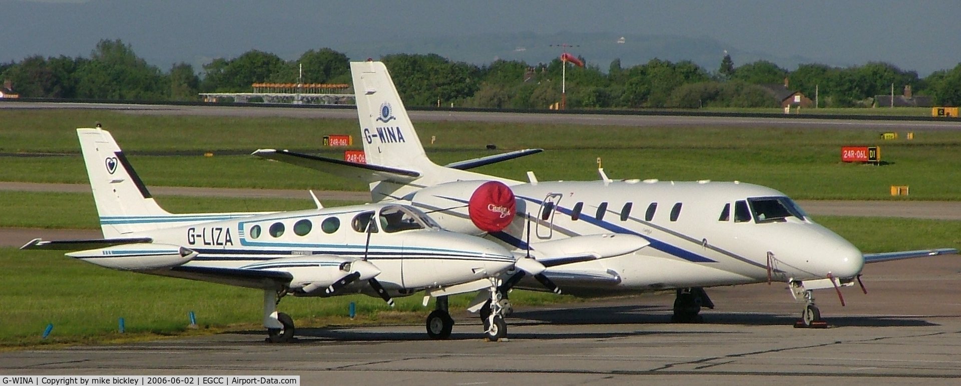 G-WINA, 2003 Cessna 560XL Citation Excel C/N 560-5343, parked with engine covers on.