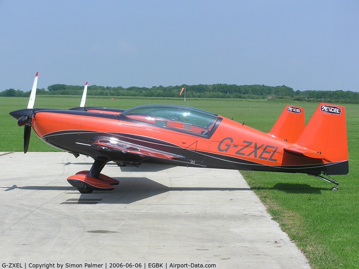 G-ZXEL, 2006 Extra EA-300L C/N 1224, Extra 300 sitting in the summer sun at Sywell