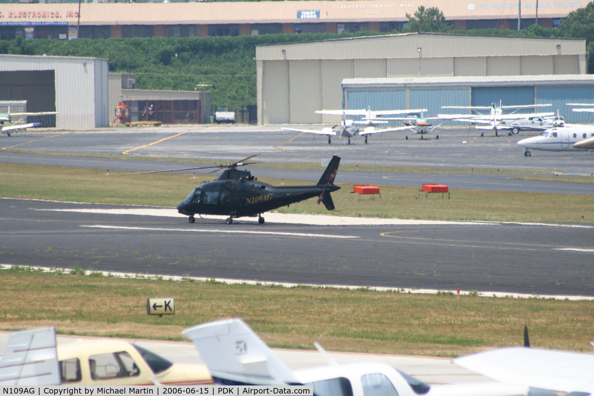 N109AG, 1984 Agusta A109A II C/N 7260, Taxing to Charlie Pad, preparing to take off.