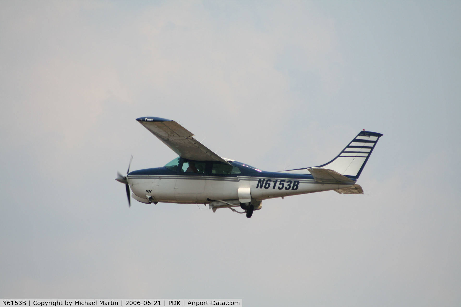 N6153B, 1978 Cessna T210M Turbo Centurion C/N 21062696, Gear up after take off from 2L