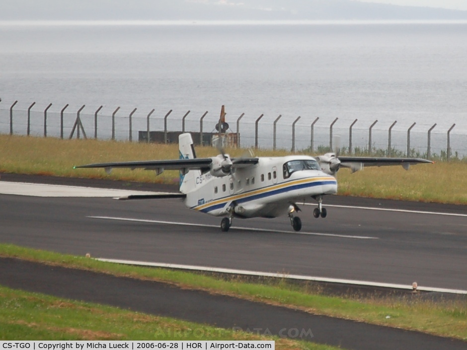 CS-TGO, 1987 Dornier 228-201 C/N 8119, Touching down at Horta/Azores. Landing gear looks funny - as if it will break off any moment...