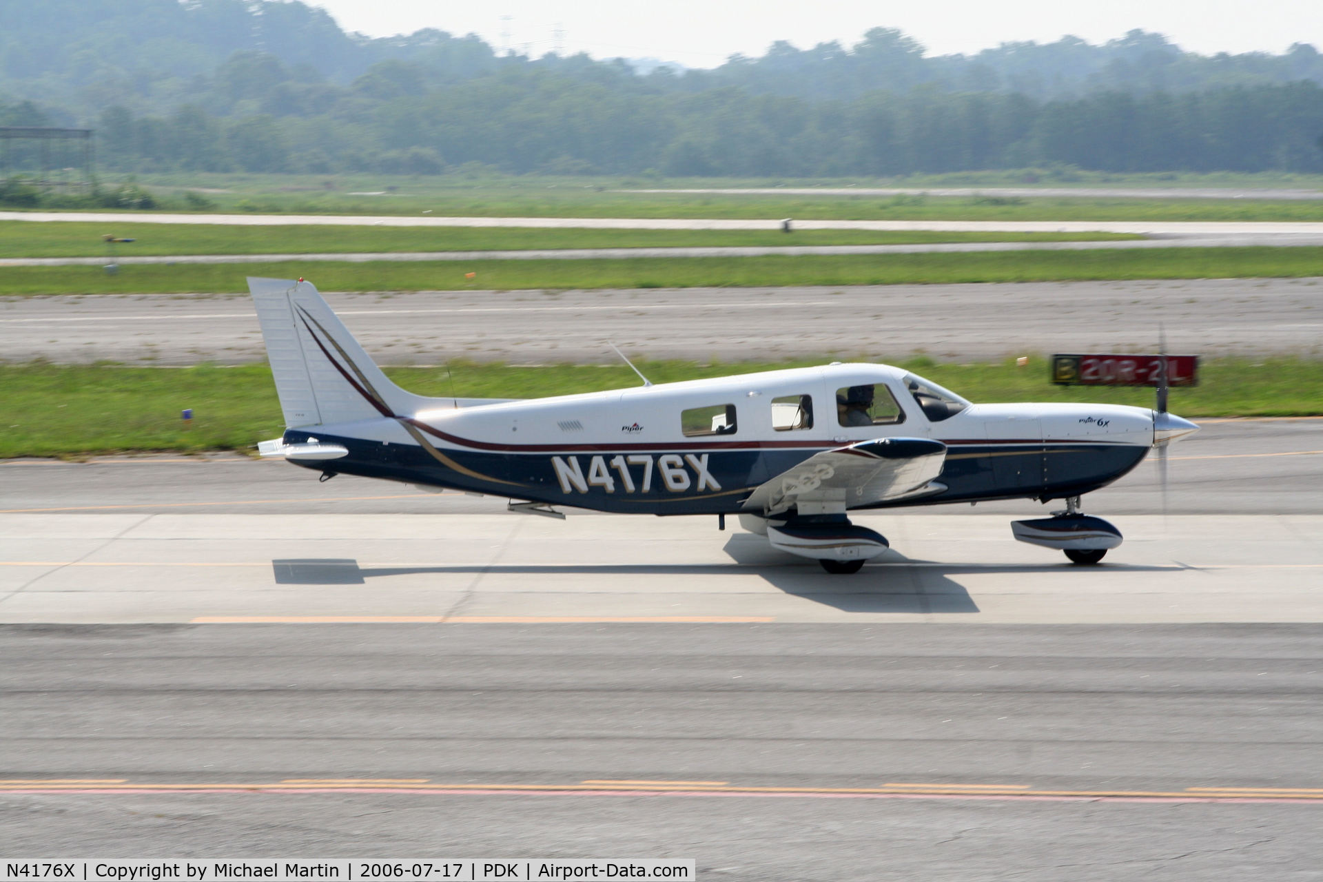 N4176X, 2003 Piper PA-32-301FT Saratoga C/N 3232013, Taxing past Mercury Air Service