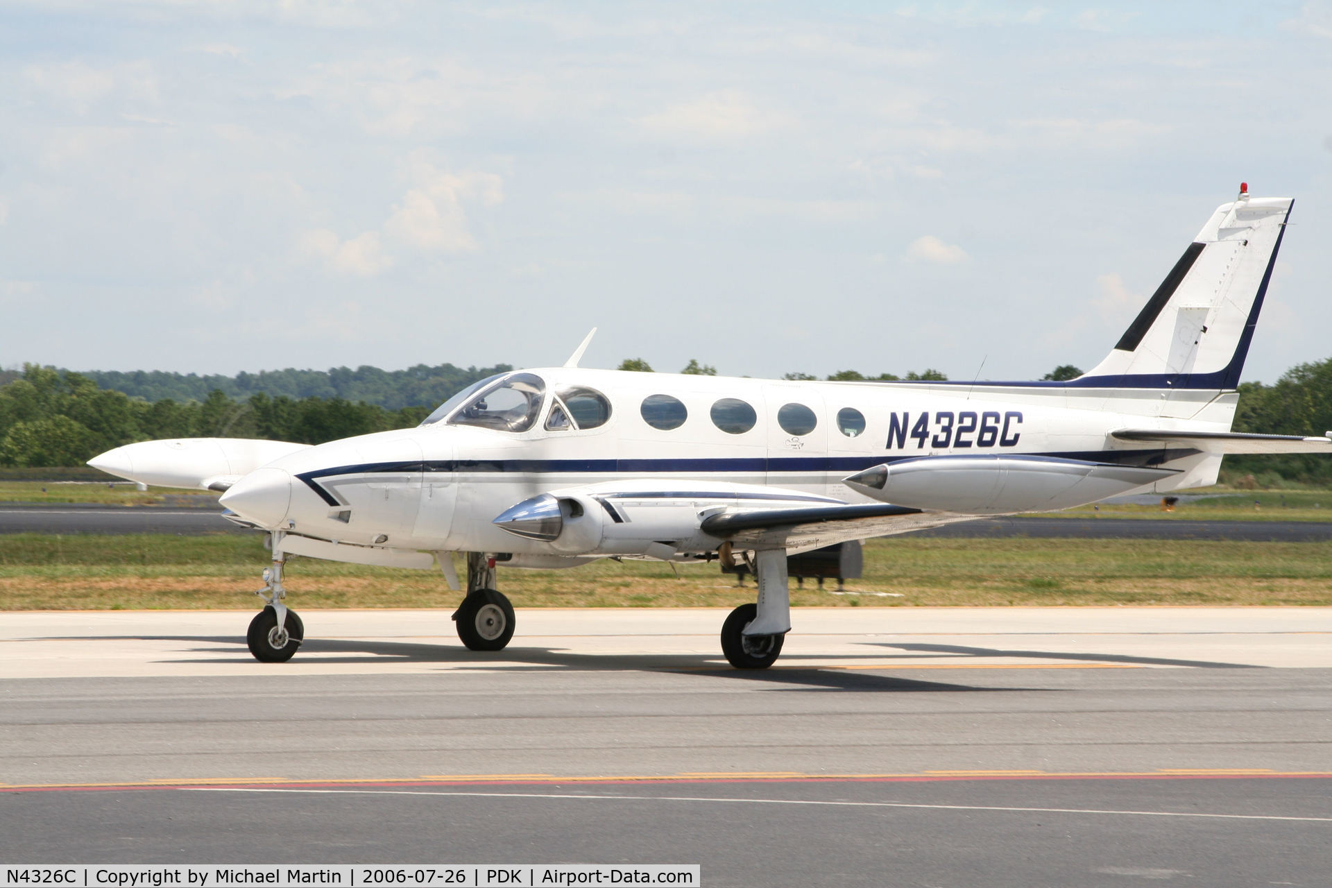 N4326C, 1976 Cessna 340A C/N 340A0075, Taxing to 20L for flight to AFJ