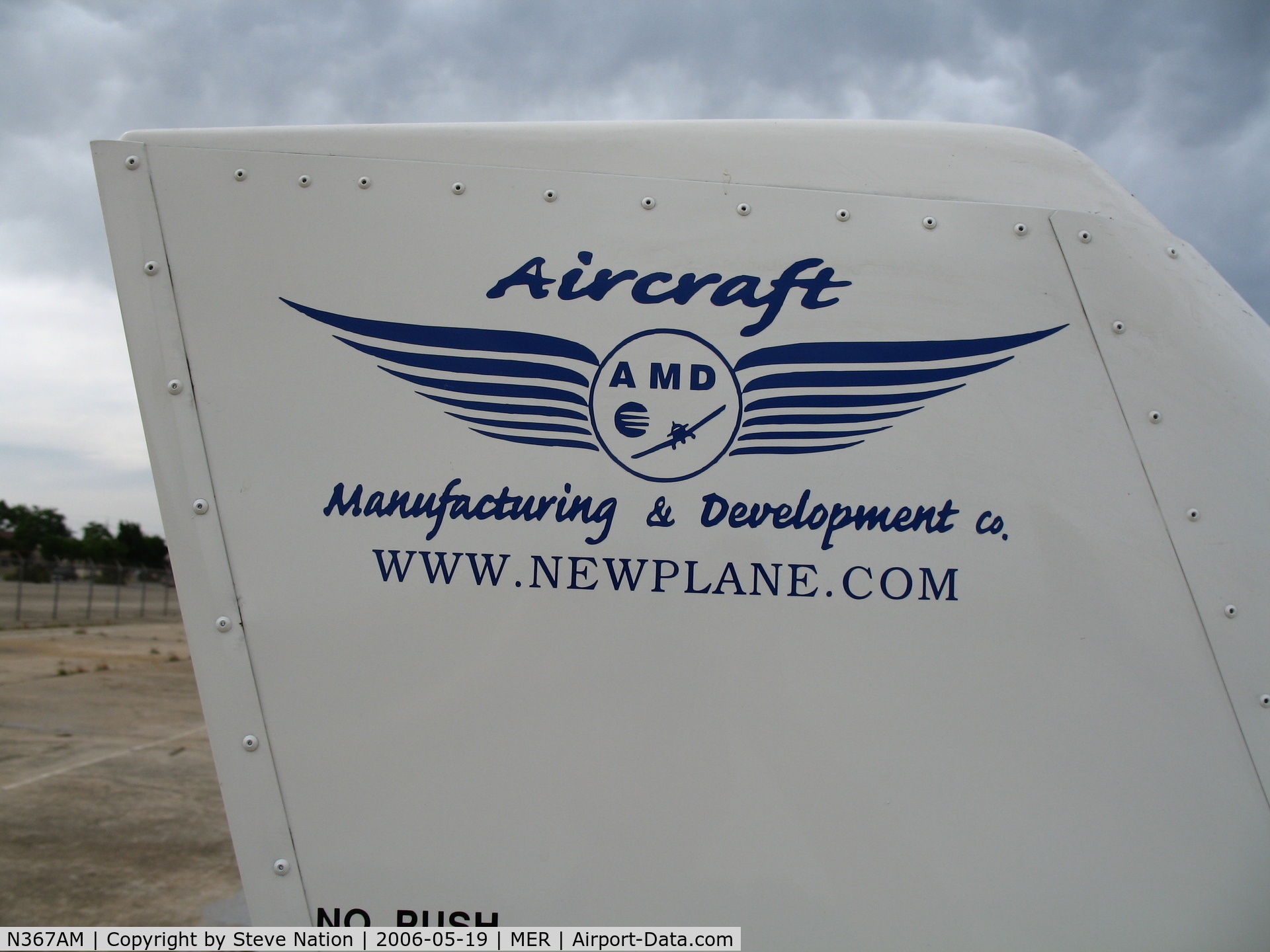 N367AM, 2005 AMD CH-2000 Alarus C/N 20-1061, close-up Aircraft Manufacturing & Development Company logo @ Castle AFB, CA