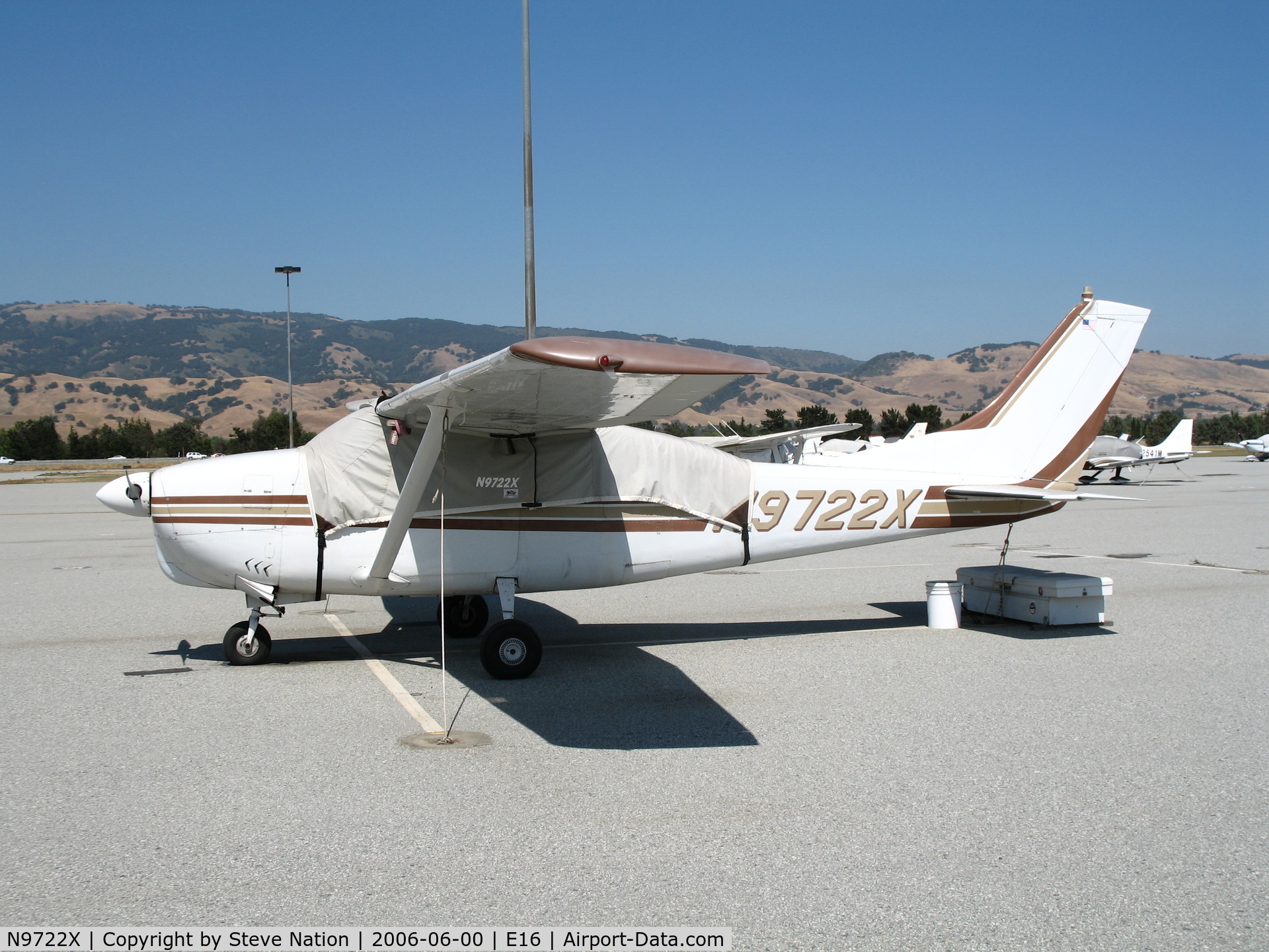 N9722X, 1962 Cessna 210B C/N 21058022, 1962 Cessna 210B with cover @ South County Airport (San Martin), CA