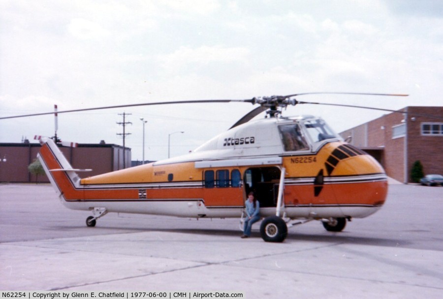 N62254, Sikorsky UH-34D Seahorse C/N 58-1193, ex USMC UH-34D BuNo. 148079. This was when it was a Winnebago Heli-Home model, with my wife sitting in the door.  We watched it fly and toured it.