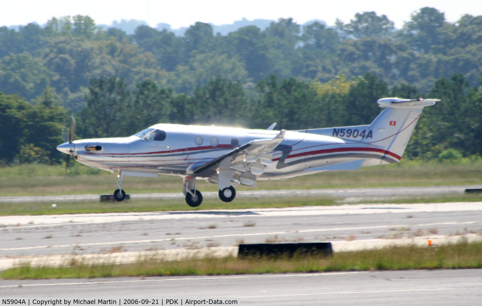 N5904A, 2004 Pilatus PC-12/45 C/N 583, Departing PDK enroute to TJIG