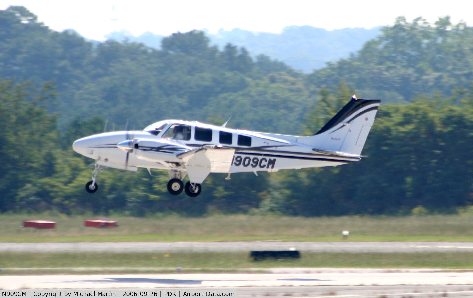 N909CM, 2001 Raytheon Aircraft Company 58 C/N TH-2022, Departing PDK on round trip mission