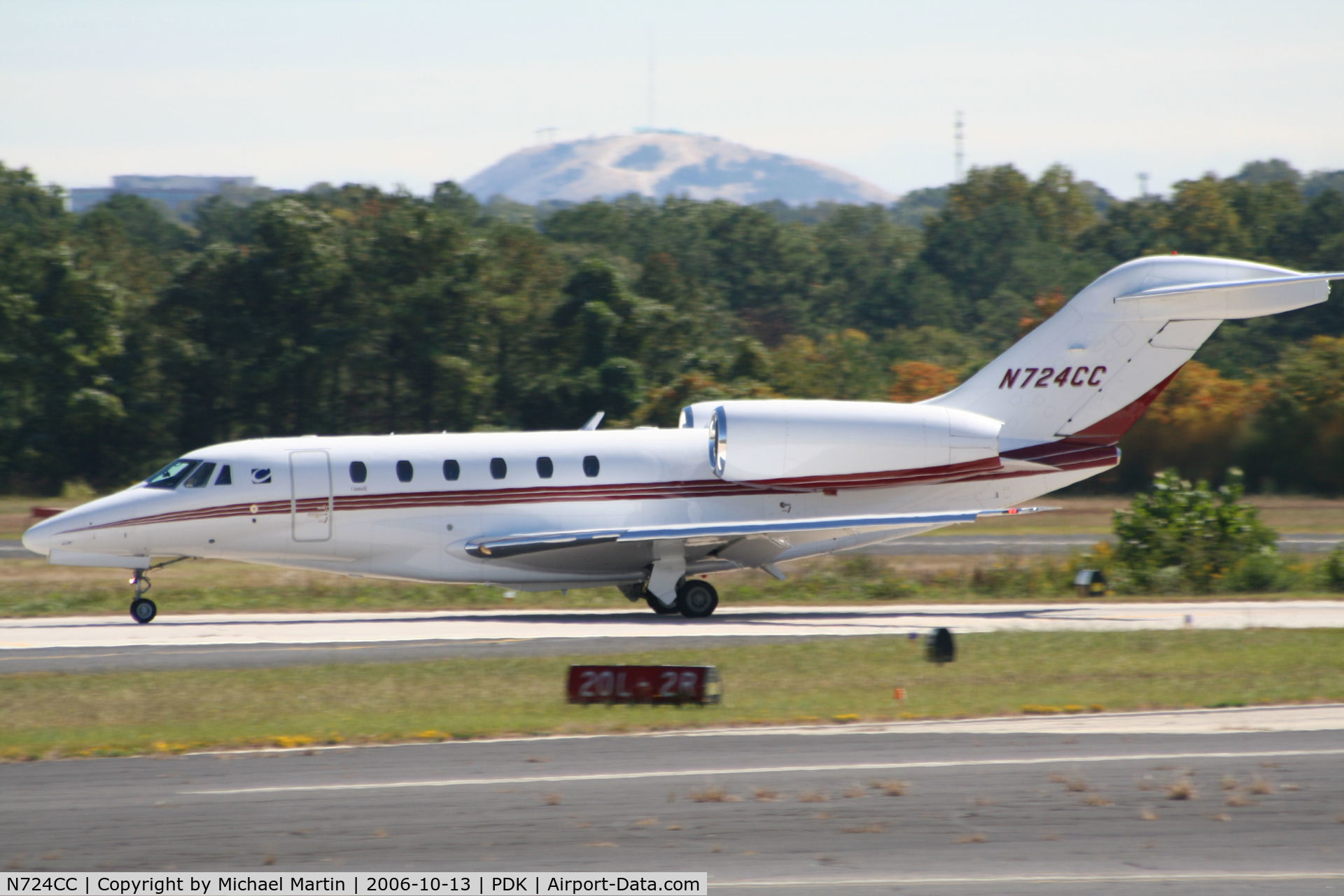 N724CC, 1998 Cessna 750 Citation X Citation X C/N 750-0062, Clear Channel departing for parts unknown