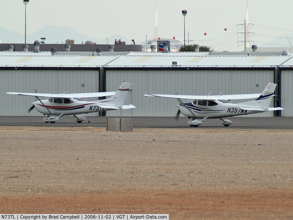 N73TL, 1999 Cessna 182S Skylane C/N 18280657, N73TL & N397MW holding short for take-off.