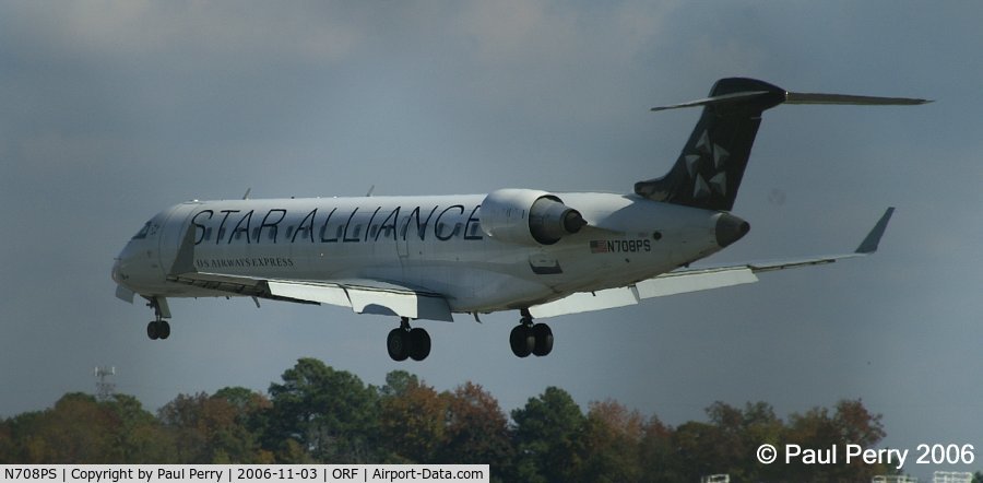 N708PS, 2004 Bombardier CRJ-701 (CL-600-2C10) Regional Jet C/N 10160, Check out the flaps, and the pretty tail.