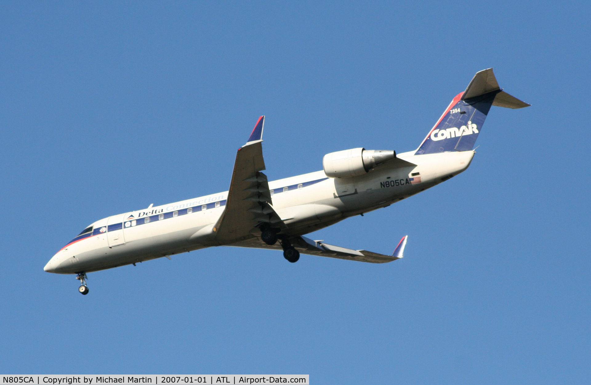 N805CA, 1999 Bombardier CRJ-100ER (CL-600-2B19) C/N 7354, Over the numbers of 26L