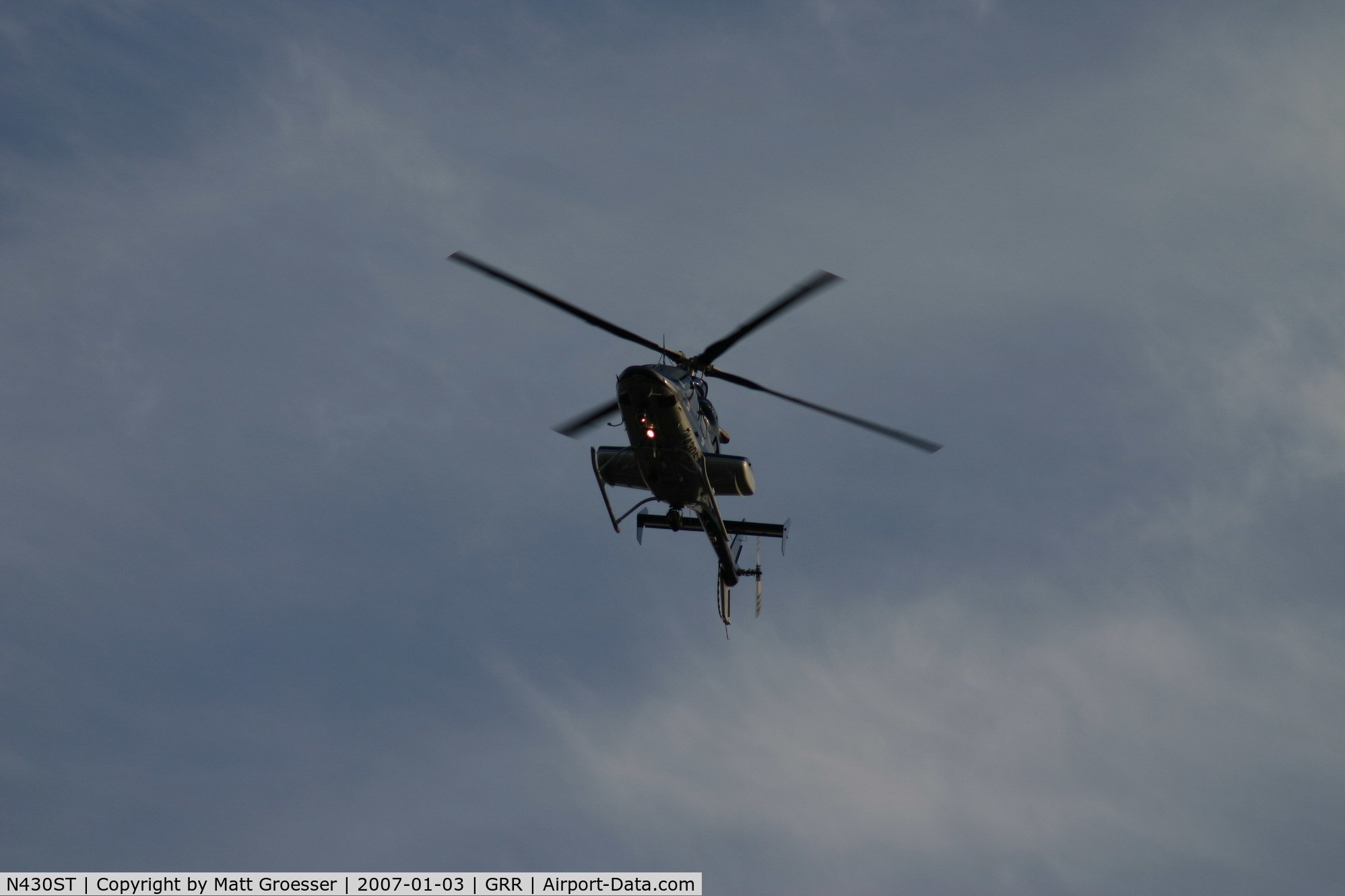 N430ST, 2000 Bell 430 C/N 49071, MSP helicopter over Grand Rapids, MI for Gerald R. Ford funeral security detail