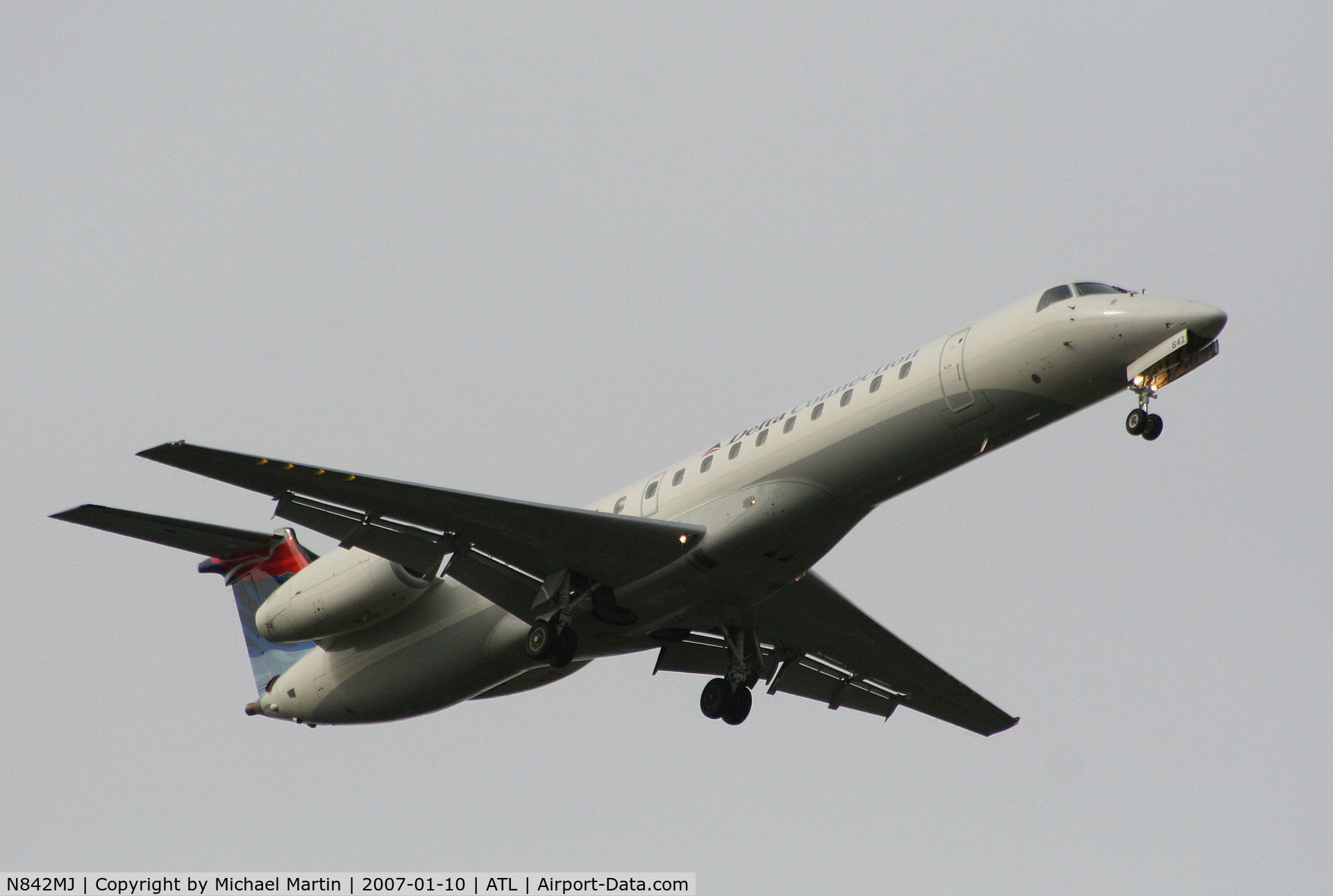 N842MJ, 2001 Embraer EMB-145LR C/N 145457, On final for Runway 9R