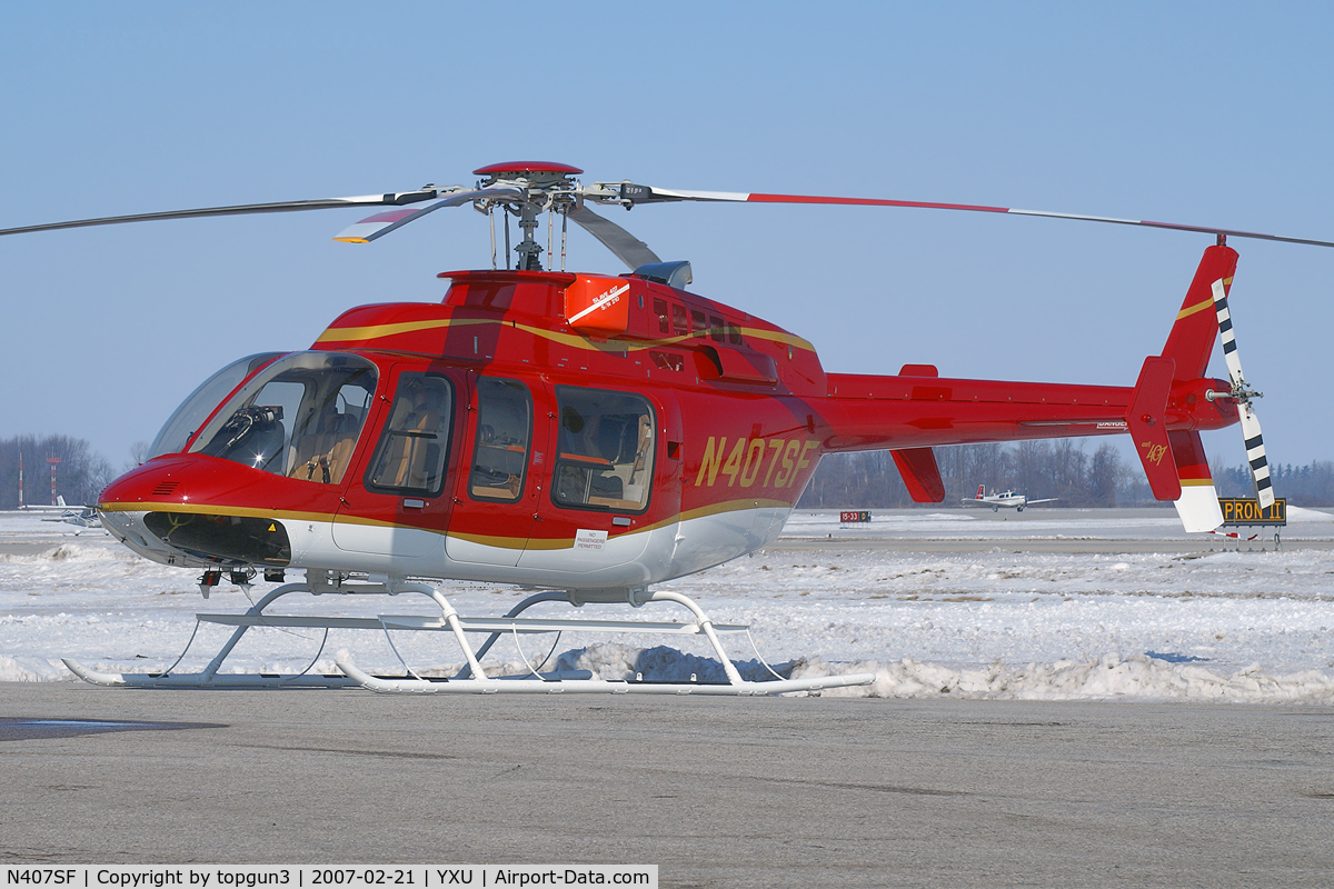 N407SF, Bell 407 C/N 53737, Parked at ESSO ramp.