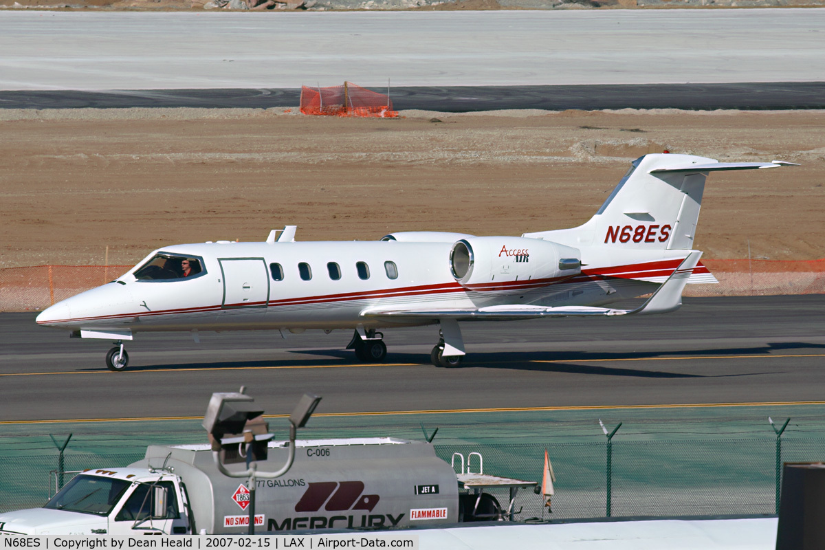 N68ES, 2001 Learjet Inc 31A C/N 221, Premier Aviation Leasing LLC's 2001 Bombardier Learjet 31A N68ES taxiing to the north complex for departure to Santa Monica Municipal (KSMO).