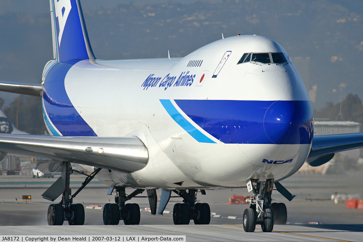 JA8172, 1985 Boeing 747-281F C/N 23350, Nippon Cargo Airlines JA8172 (FLT NCA182) from Ted Stevens Anchorage Int'l (PANC) taxiing across the newly-built, yet unopened RWY 25L/7R, on Taxiway Sierra Tango.