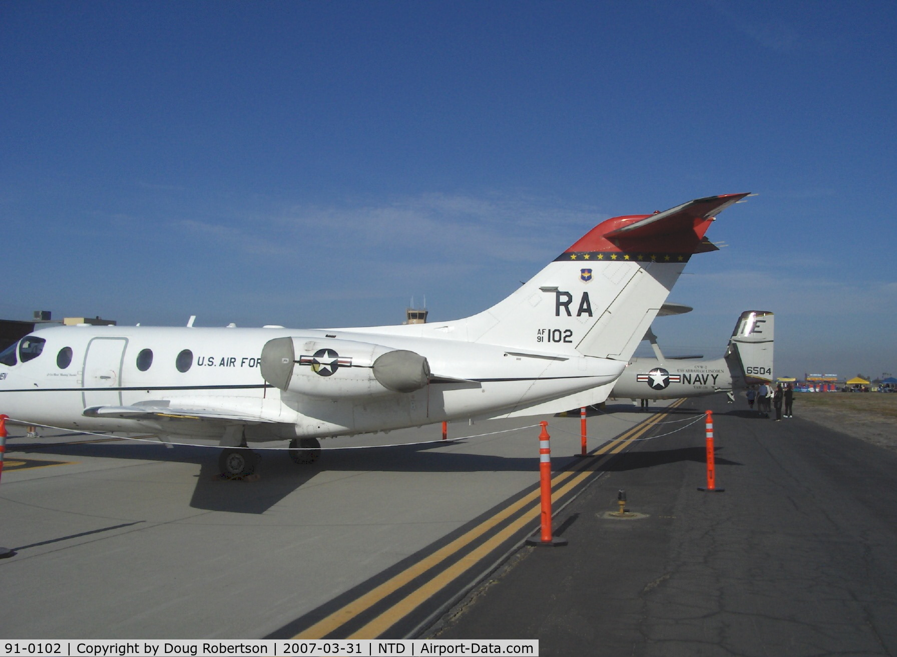 91-0102, 1991 Beechcraft T-1A Jayhawk C/N TT-43, USAF BEECH T-1A JAYHAWK TTTS (Tanker/Transport Trainer System), 2 Pratt & Whitney JT15D-5B Turbojets 2,908 lb st each. Tail data. Slightly modified business jet. Extra fuel tanks, thrust reversers simulate handling large transport aircraft.